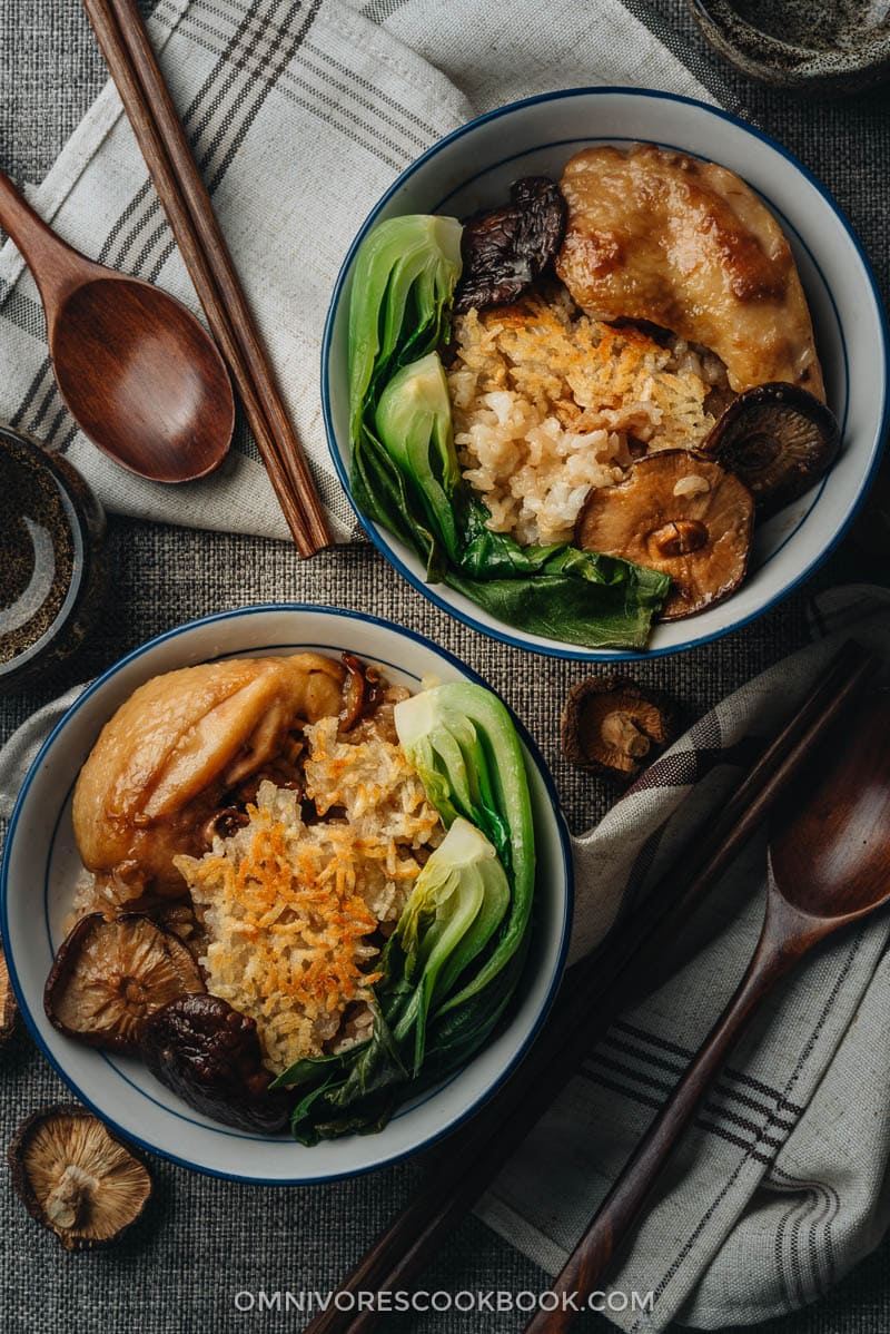 Clay Pot Chicken Rice - This clay pot chicken rice is so addictive! Beyond the greatness of the tender and moist chicken, the rice absorbs all the extract from the mushrooms and chicken grease, and is then seasoned with oyster sauce. It is SO good! My recipe teaches you the easiest way to create a super flavorful one-pot dinner without a clay pot or rice cooker. Homemade clay pot chicken