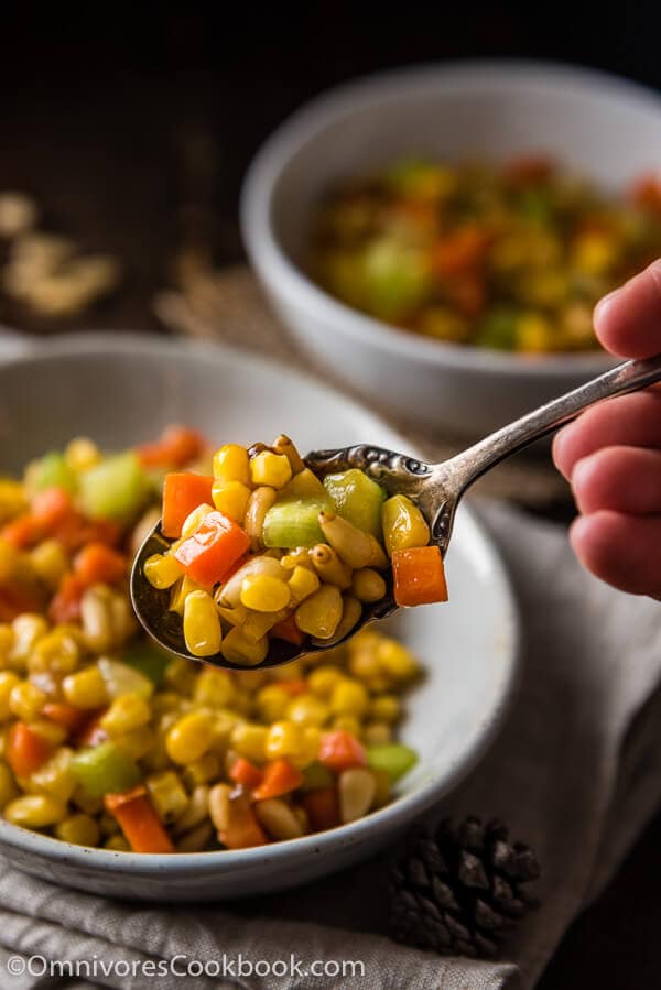 Stir Fried Corn with Pine Nuts (松仁玉米) - The sweet corn kernels, pine nuts, cucumber, and carrot are lightly seasoned with green onion, salt, and sugar. Every ingredient comes together to create a hearty meal that is nutty and sweet | www.nrtjwh.eu.org