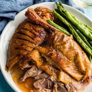 The Best Slow Roast Duck (A recipe from a chef) - The duck is stuffed with citrus, then slow cooked until the meat is falling off the bones and the skin perfectly crisped. | www.nrtjwh.eu.org