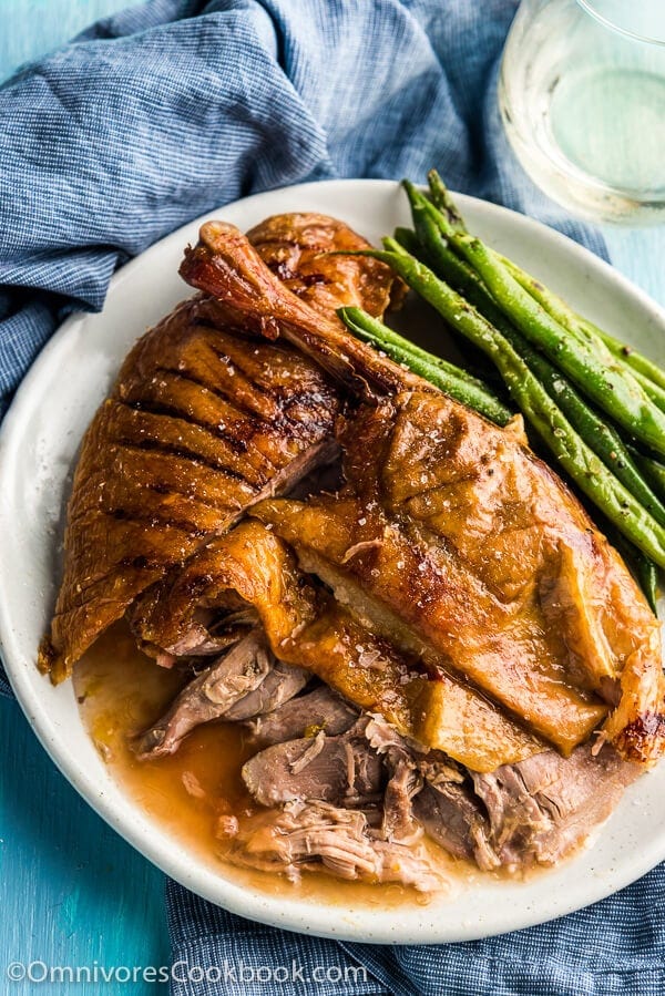 The Best Slow Roast Duck (A recipe from a chef) - The duck is stuffed with citrus, then slow cooked until the meat is falling off the bones and the skin perfectly crisped. | www.nrtjwh.eu.org