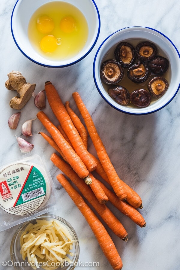 Carrot Dumplings - An elegant vegetarian dumpling that uses carrots, bamboo shoots, mushrooms, and eggs to create a fresh, moist, and rich filling.
