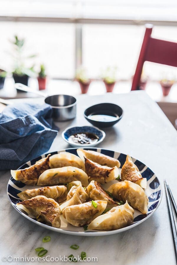 Carrot Dumplings - An elegant vegetarian dumpling that uses carrots, bamboo shoots, mushrooms, and eggs to create a fresh, moist, and rich filling.