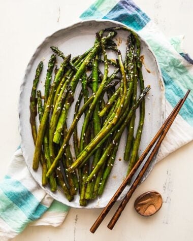 Hoisin Roasted Asparagus - Requires only two ingredients; the asparagus are perfectly charred, flavorful, and tender. You can either grill them or bake them in the oven.