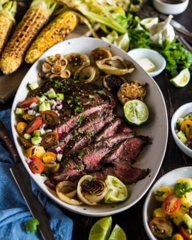 This recipe shares the secrets to creating the tenderest marinated flank steak that is bursting with flavor; included are salad and side dish ideas for an inexpensive dinner party.