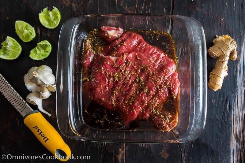 This recipe shares the secrets to creating the tenderest marinated flank steak that is bursting with flavor; included are salad and side dish ideas for an inexpensive dinner party.
