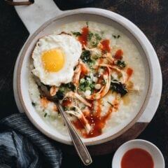 Instant Pot congee with tender chicken and spinach is your perfect one-bowl dinner. It only takes 2 minutes to prepare and you&rsquo;ll have dinner ready in 30 minutes. #glutenfree #recipes #chicken #instantpot