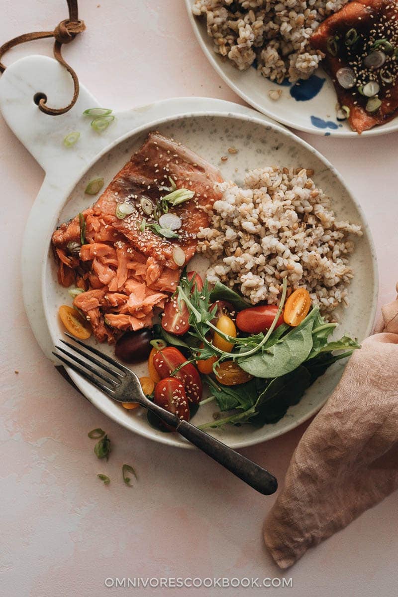 5-Ingredient Sous-Vide Salmon with Asian Sauce - cooking moist, tender, and flaky salmon in a rich Asian sauce without marinating. #ad #FoodSaverSousVide #simple #fillet #recipes #healthy Moist flaky sous-vide salmon with Asian sauce served with brown rice and salad