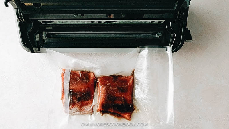 5-Ingredient Sous-Vide Salmon with Asian Sauce - cooking moist, tender, and flaky salmon in a rich Asian sauce without marinating. #ad #FoodSaverSousVide #simple #fillet #recipes #healthy Using FoodSaver® FM2000 Vacuum Sealing System to prepare salmon