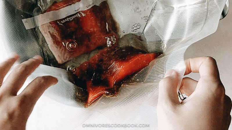 5-Ingredient Sous-Vide Salmon with Asian Sauce - cooking moist, tender, and flaky salmon in a rich Asian sauce without marinating. #ad #FoodSaverSousVide #simple #fillet #recipes #healthy Cooking sous-vide salmon in FoodSaver® Sous-vide Vacuum Seal Bags