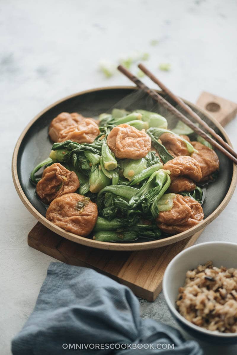 Stir Fried Baby Bok Choy with Gluten Balls - Very easy to make and bursting with flavor, it’s a great choice if you’re trying to find an interesting way to spice up your vegetarian meal and add a dose of plant-based protein. #chinese #recipes #vegan #stirfry Stir fried baby bok choy with gluten balls