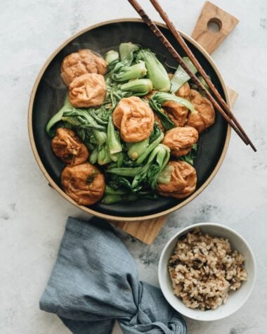 Stir fried baby bok choy with gluten balls served with brown rice