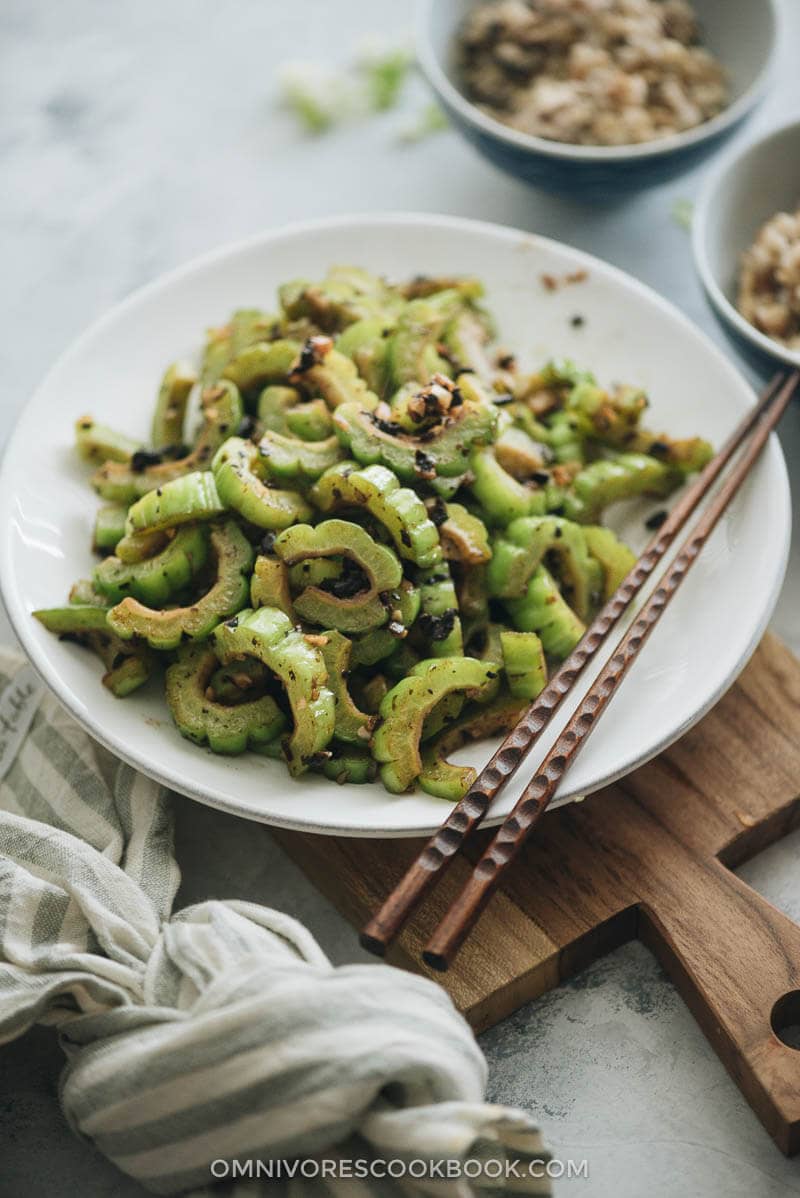 Stir Fried Bitter Melon with Fermented Black Beans - This quick, tasty, and healthy side dish will surprise you with its beautiful simplicity and rich flavor. #glutenfree #chinese #healthy Stir fried bitter melon with fermented black beans close up