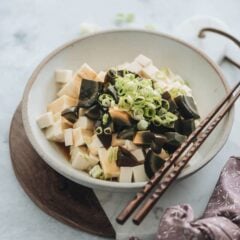 Tofu with Century Egg Salad - A childhood favorite and a popular diner food, the tofu with century egg salad requires just five ingredients and takes five minutes to make. Experiment with this new ingredient if you&rsquo;re interested in discovering what people eat in China. {Gluten-Free adaptable}
