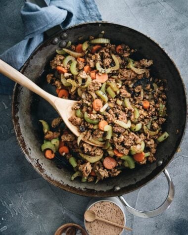 Ground beef stir fry with celery in a frying pan