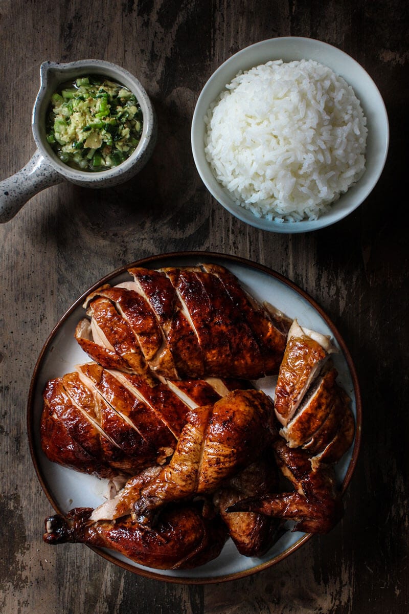 Oven Roasted Peking Chicken - A cross between a roasted chicken and Peking duck, this recipe is for days when you have that craving for peking duck but chicken is all you have to work with. Oven roasted Peking chicken served in a plate