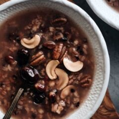 Eight Treasure Congee - Made with whole grains, nuts, and dried fruits, it&rsquo;s nutritious, comforting, and easy to make. It&rsquo;s a perfect side for a weekday dinner and it tastes as good as a dessert. Both stovetop and Instant Pot versions are included. #glutenfree #vegan