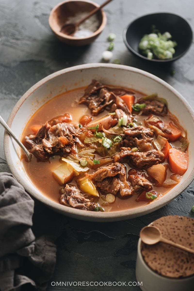 Pressure Cooker Oxtail Soup (An Instant Pot Recipe) - A simplified version using minimal prep and time to cook everything in one pot. No searing or par-boiling required. The oxtails will turn out soft like butter and the soup rich and hearty. Both Instant Pot and stovetop pressure cooker methods are included. {Gluten-Free} Pressure cooker oxtail soup
