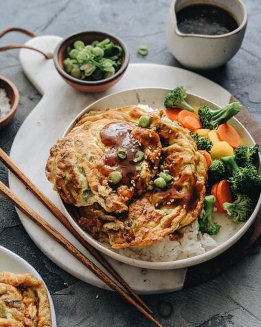 Egg foo young with gravy on rice
