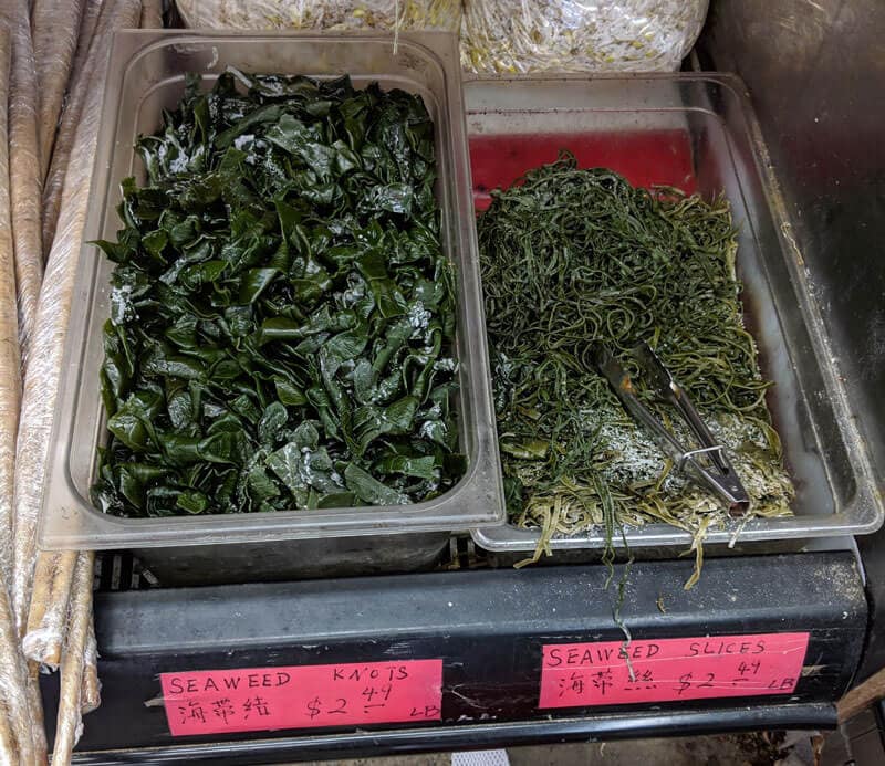 Chinese Seaweed Salad - Tender meaty seaweed salad served in a savory, sour, and garlicky sauce. It’s very easy to make and is a perfect cold appetizer to add nutrition to your meal in the summer. {Vegan} Fresh seaweed (kombu) in Asian market
