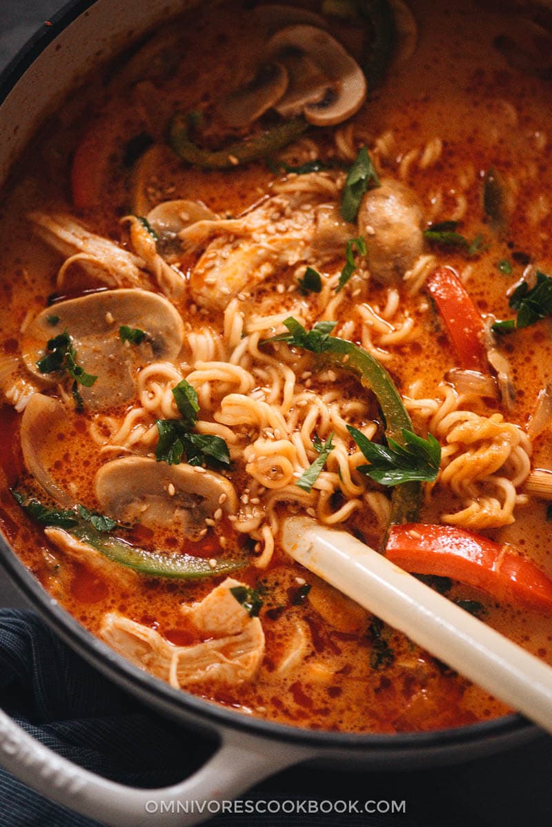 This Thai peanut butter ramen is a perfect dish for your weekday dinner. The tender noodles, juicy chicken and colorful veggies are soaked in a rich broth that is nutty, savory, spicy and sweet. It’s so easy to make and you can easily make it into a vegan version as well. Thai peanut butter ramen close up