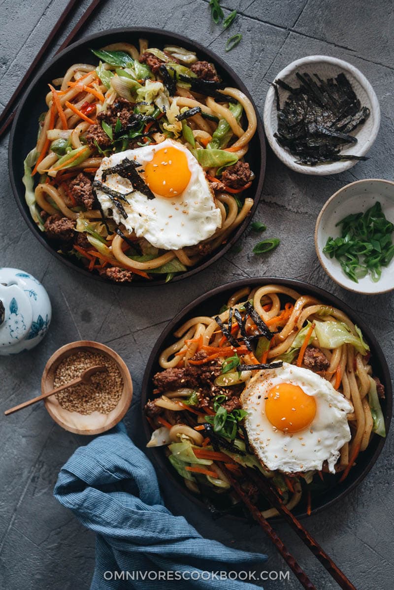Easy Fried Udon - An easy fried udon recipe with a Chinese twist that yields a rich result that tastes like a beef burger. The recipe calls for very basic ingredients and doesn’t require a wok. Try it out if you like takeout - you’ll like this homemade version even better. Yaki udon served in plates
