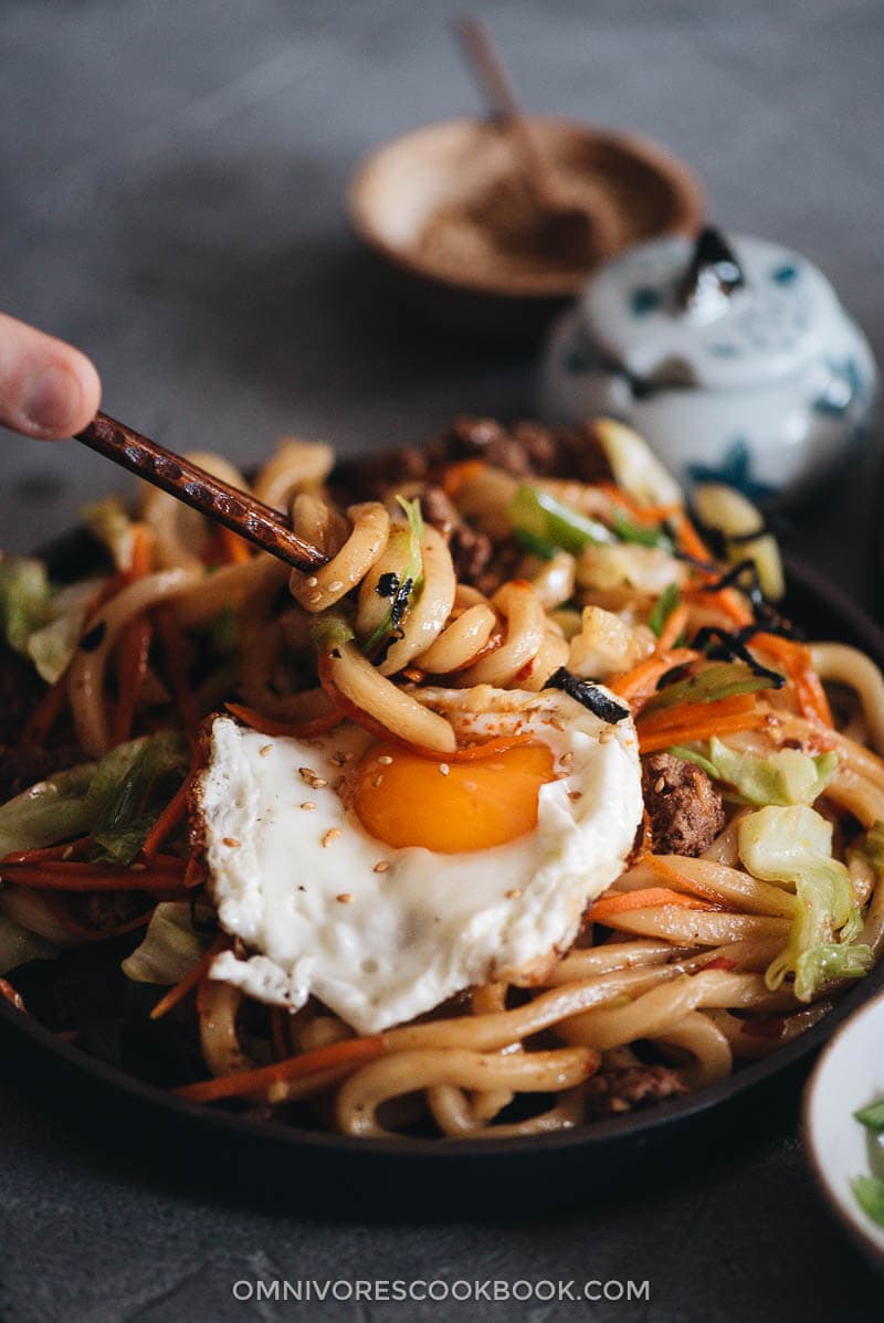 Easy Fried Udon - An easy fried udon recipe with a Chinese twist that yields a rich result that tastes like a beef burger. The recipe calls for very basic ingredients and doesn’t require a wok. Try it out if you like takeout - you’ll like this homemade version even better. Easy fried udon served served with sunny side egg