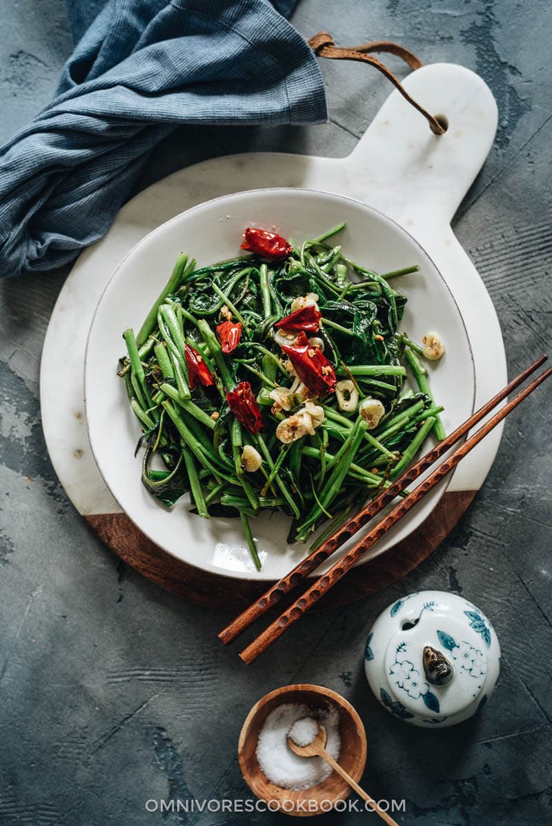 Stir-Fried Water Spinach - Two Ways | Introducing two ways to cook stir-fried water spinach, and both require fewer than five ingredients. Try out this Chinese leafy green to add color and nutrition to your dinner table. {Vegan, Gluten-Free} Homemade stir fried water spinach