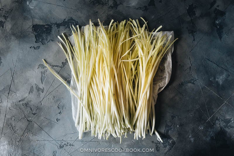 Yellow chives and eggs stir fry - Made with 3 ingredients, this dish is light, nutritious, and hearty. Serve it as a side dish or top it on steamed rice as a light main. {Gluten-Free} Chinese yellow chives