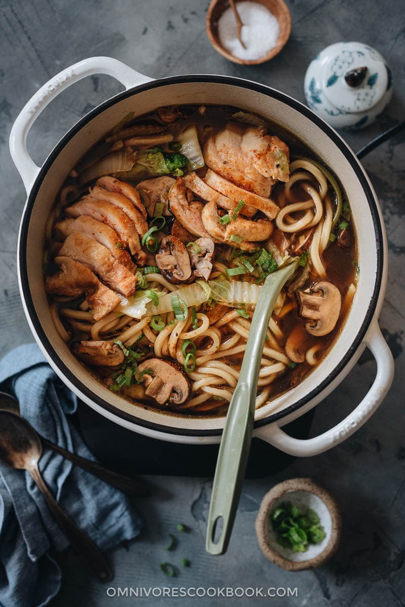 Chicken Udon Soup - A super simple one-pot noodle soup that guarantees maximum satisfaction with beautifully charred chicken, rich soup, thick noodles, and tender veggies. Chicken udon soup in a pot