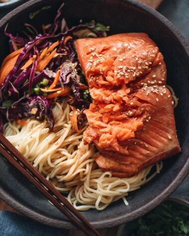 Noodles with flaky salmon on top