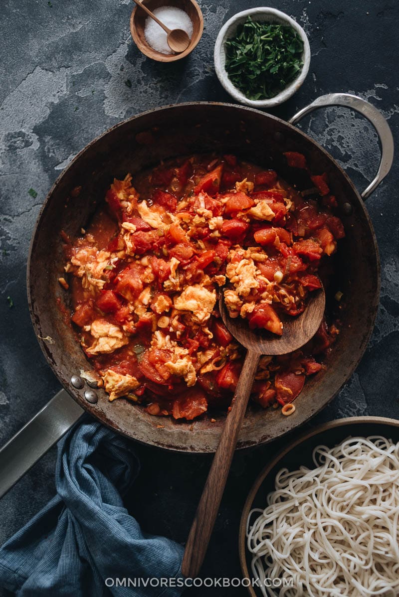 15-Minute Tomato Egg Noodles | Make this dish when you’re in a rush because it takes no time to whip it up for a comforting meal. The scrambled eggs are cooked with tomatoes, aromatics, and a drizzle of soy sauce to create a simple scrumptious sauce, served on top of boiled noodles. So simple and hearty. {Gluten-Free adaptable}