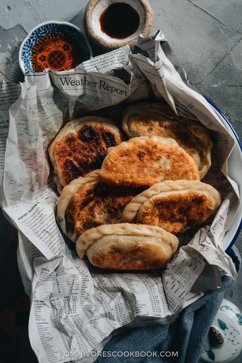 Chinese Chive Pockets (韭菜盒子, Chinese Chive Dumplings) | The super crispy and thin dough is stuffed with a hearty, savory filling made with Chinese chives and scrambled eggs. They’re easier to make than potstickers and have all the goodness that dumplings have, only more satisfying! Homemade Chinese chive dumplings
