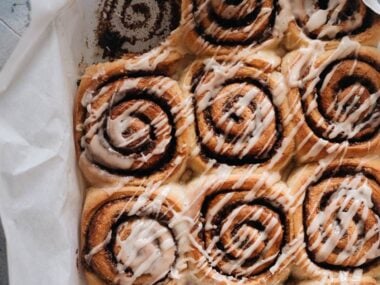 Cinnamon rolls in a pan with glaze