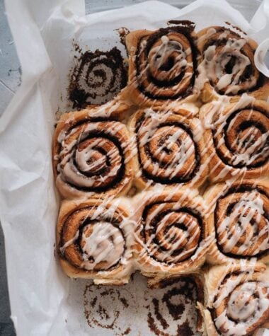 Cinnamon rolls in a pan with glaze