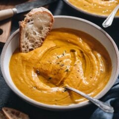 Roasted Kabocha Squash Soup | An easy recipe that yields a well-balanced, hearty, creamy soup that is garlicky and lightly sweet. You can use butternut or acorn squash if you cannot find kabocha. You can easily make the dish vegan as well. Make a big batch in advance and serve it with toasted bread for a healthy dinner. {Vegan-Adaptable, Gluten-Free}