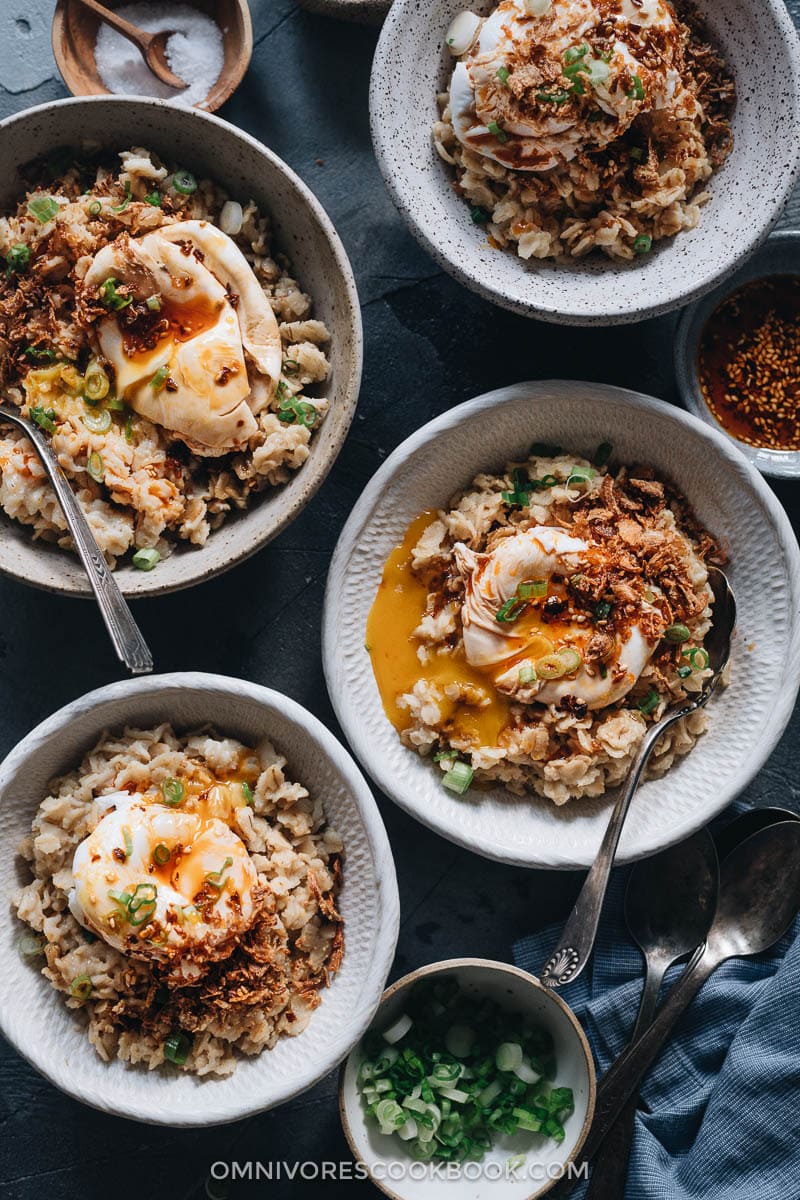 5-Ingredient Savory Oatmeal (Chinese-Style) | This oatmeal is simmered with chicken stock until creamy, topped with runny eggs, seasoned with soy sauce and chili oil, and finished up with crispy fried shallots. This breakfast dish is so easy to put together and the combo creates a bold taste with a beautiful texture. {Gluten-Free adaptable} Savory oatmeal with runny eggs and fried shallots