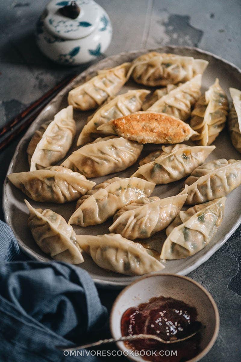 Turkey dumplings (A Thanksgiving Leftover Recipe) | Turn Thanksgiving leftovers into fancy dim sum using this turkey dumpling recipe. It uses leftover mashed potatoes, turkey, and cranberry sauce to make crispy, hearty, and juicy dumplings that are even better than takeout. Homemade dumplings