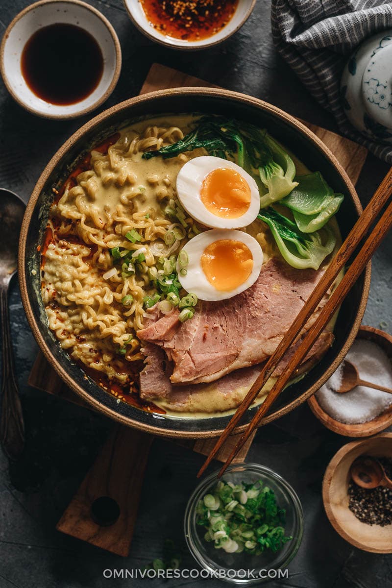 15-Minute Curry Ramen with Leftover Ham | A super easy recipe that turns your leftover ham into a scrumptious one-pot dinner. The curry broth is made with coconut milk, butter, and garlic to create a super rich texture that’s bursting with flavor. I’ve included notes so you can tweak the recipe using ingredients you already have in your pantry. {Gluten-Free adaptable} Ramen topped with ham, egg, and baby bok choy