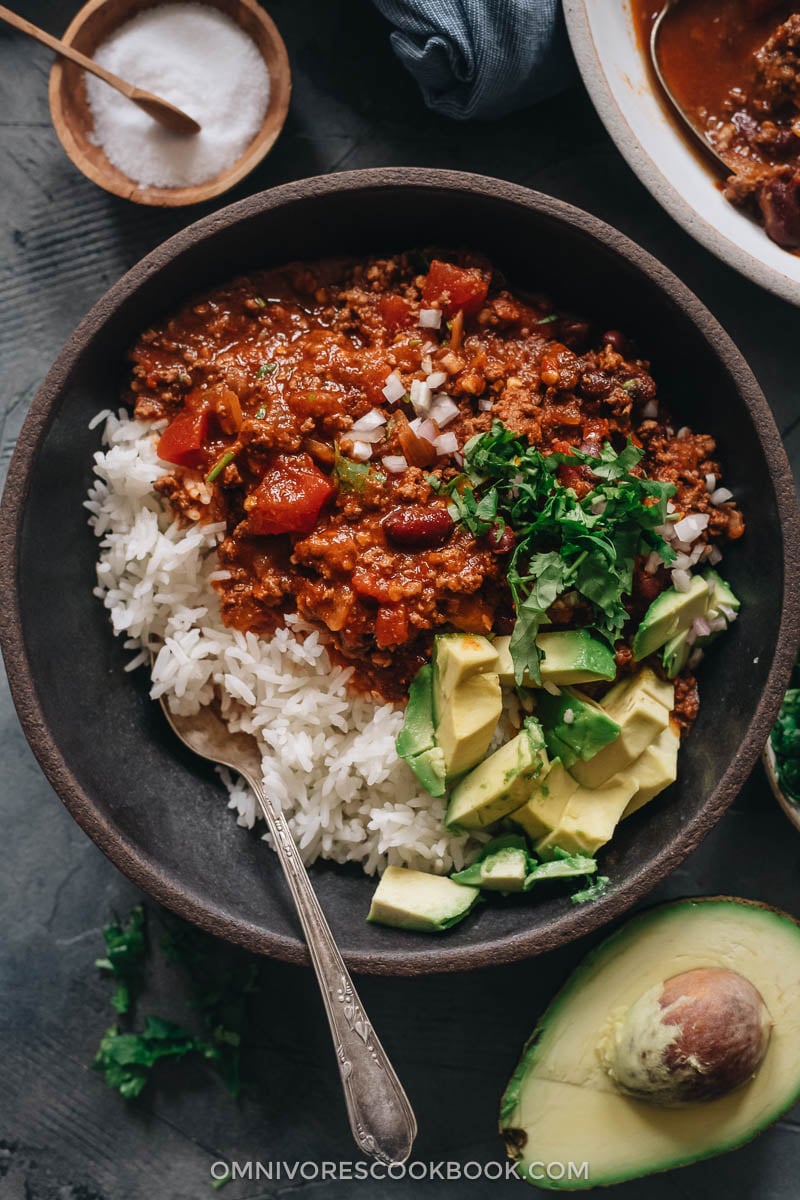 Chinese Chili (Sichuan Style) | Make a hearty pot of chili using Sichuan ingredients to create a super rich and deep umami while keeping the essence of a traditional chili. The recipe teaches you how to make a flavorful chili paste, but you can also use chili powder to make the recipe super easy. Chinese served over steamed rice with avocado and cilantro