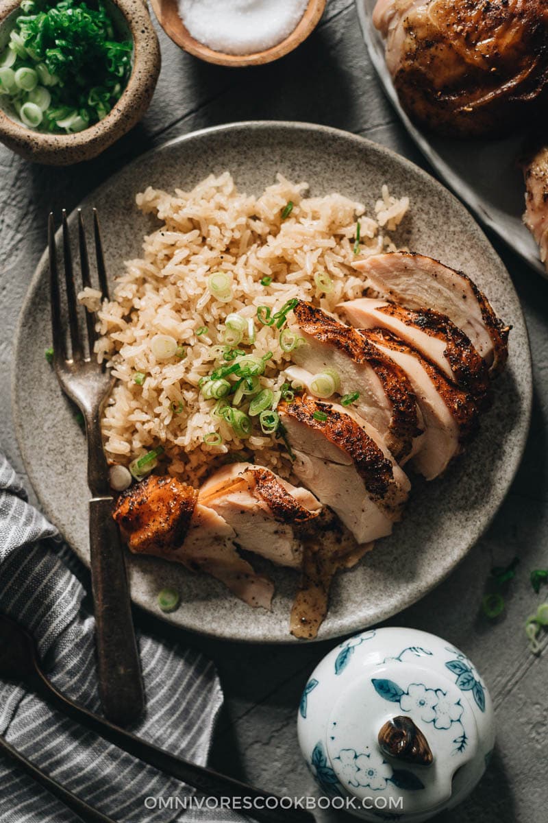 Sliced roast chicken breast served on rice