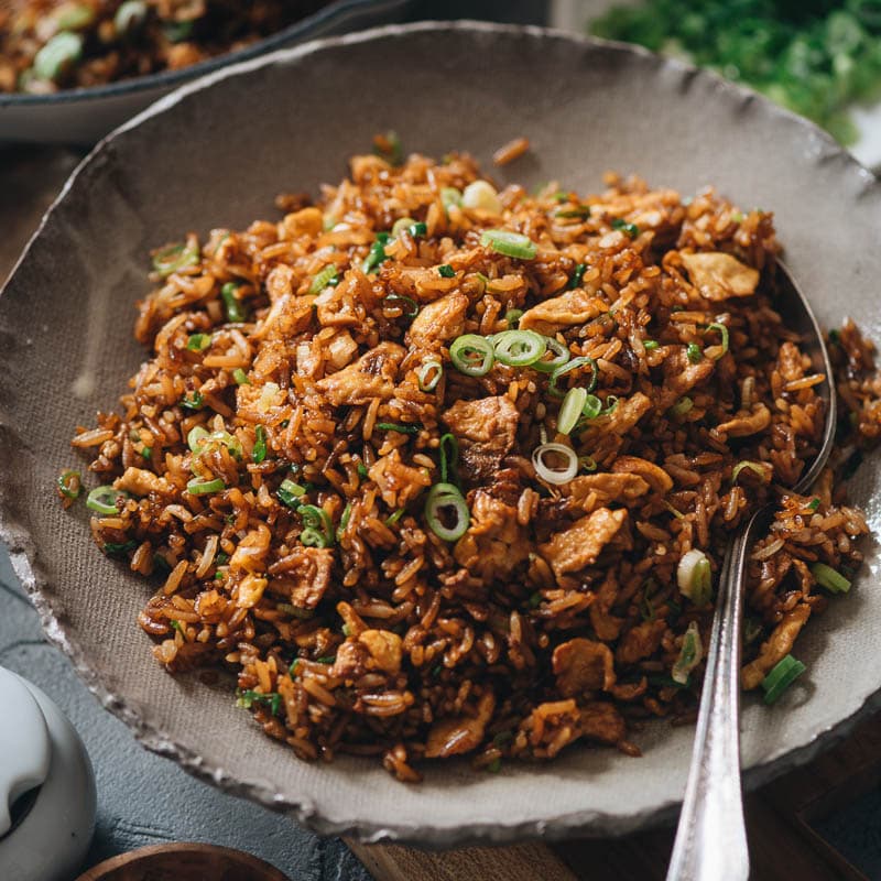 Soy Sauce Fried Rice (酱油炒饭) | Simple yet indulgent, it&rsquo;s a classic Chinese takeout dish that uses minimal ingredients to create maximum flavor. Only takes ten minutes to prepare, and it&rsquo;s robust enough to serve as a main or to satisfy your midnight salty snack craving.
