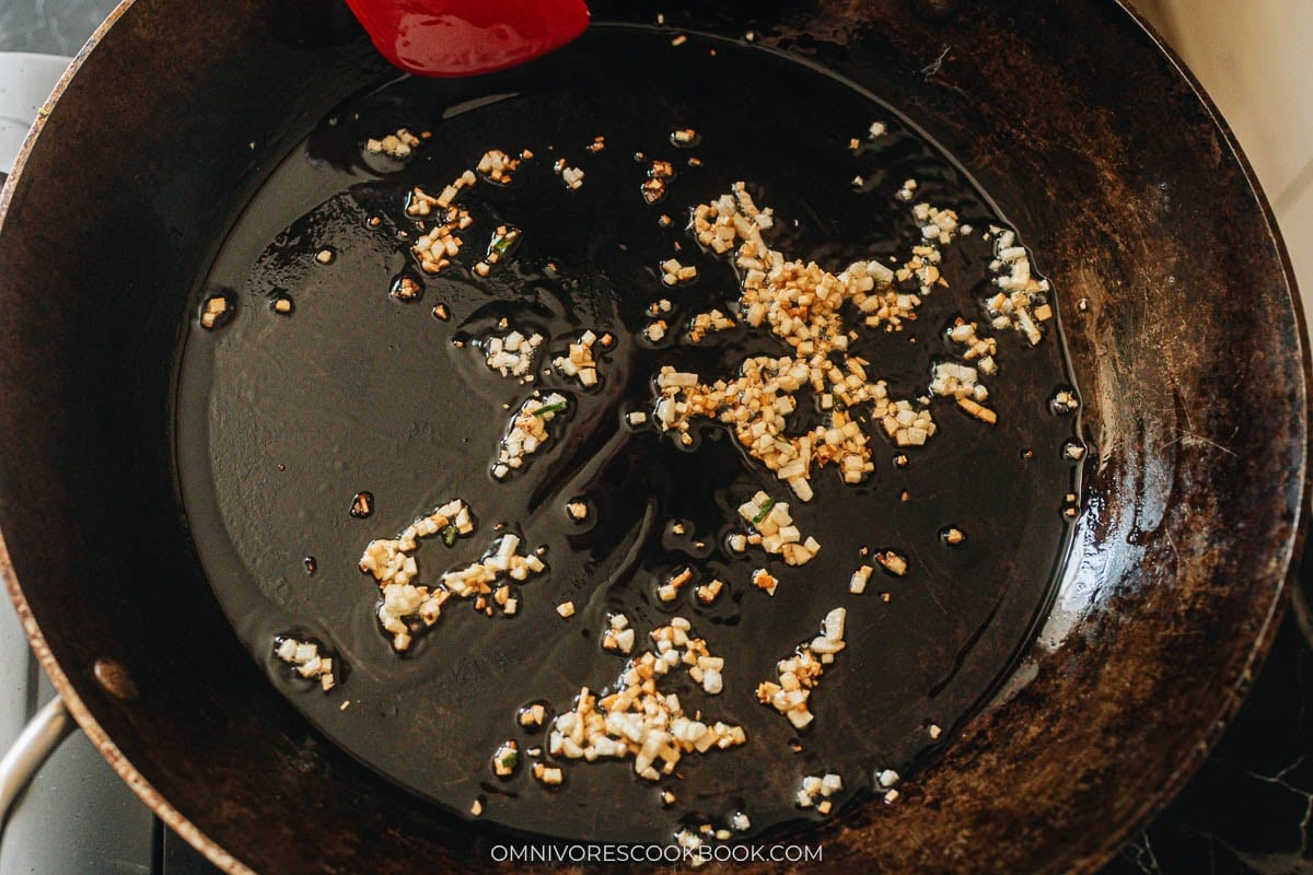 Cook garlic until golden brown