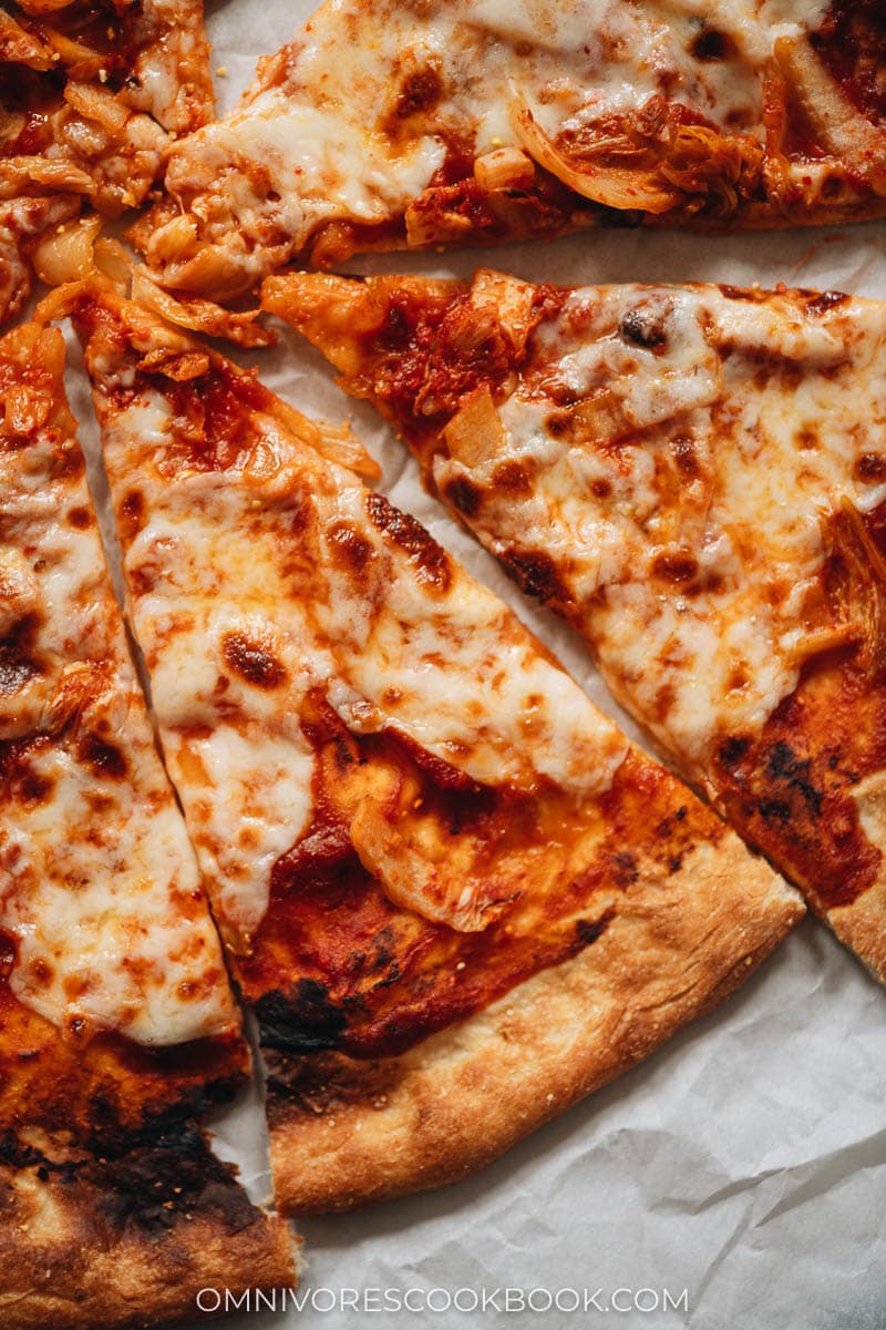Pizza with hot sauce and mozzarella close-up