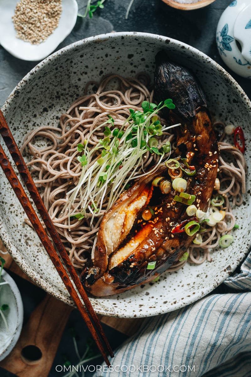 Eggplant served with soba noodles and garlic sauce