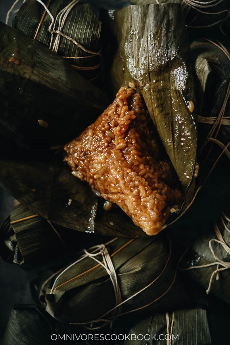 Pork zongzi on bamboo leaves