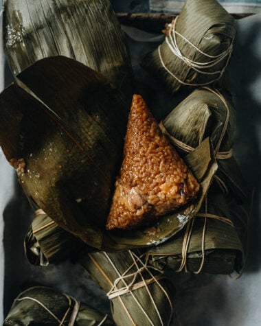 Savory zongzi on bamboo leaves