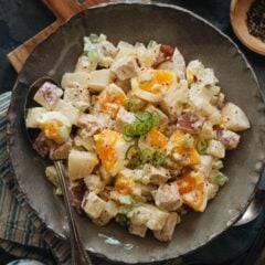 Turn any meal into a picnic with this creamy chicken potato salad. It&rsquo;s loaded with chunks of tender potatoes, flavorful chicken, and soft-boiled eggs for a rich side! {Gluten-Free}
