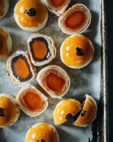 Modern mooncake with red bean and lotus seed paste and egg yolk