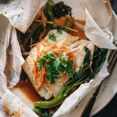 Instead of cooking your fish the same old way, try this Chinese-inspired Fish en Papillote that treats cod to a gingery soy sauce for a delicate and flavorful meal that’s ready in 22 minutes! It is perfect for Valentine’s Day or a romantic date night, as it’s a super-easy sheet pan dinner that will show your love. {Gluten-Free Adaptable}