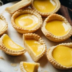 Authentic Chinese bakery style Hong Kong egg tart that features flaky crumbly pastry crust filled with a sweet creamy custard that you&rsquo;ll want to eat morning, noon, and night!